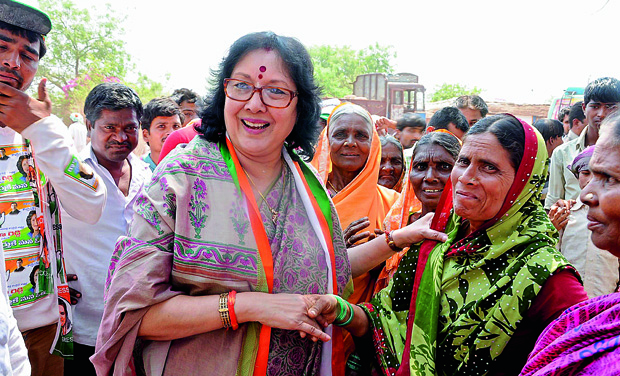 Dr Geetha Reddy meets local women while campaigning in Zaheerabad on Saturday. Dr Geetha Reddy meets local women while campaigning in Zaheerabad on Saturday.